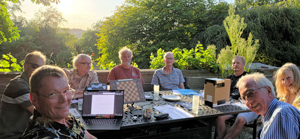 Seaton Chess Club members sitting around a table